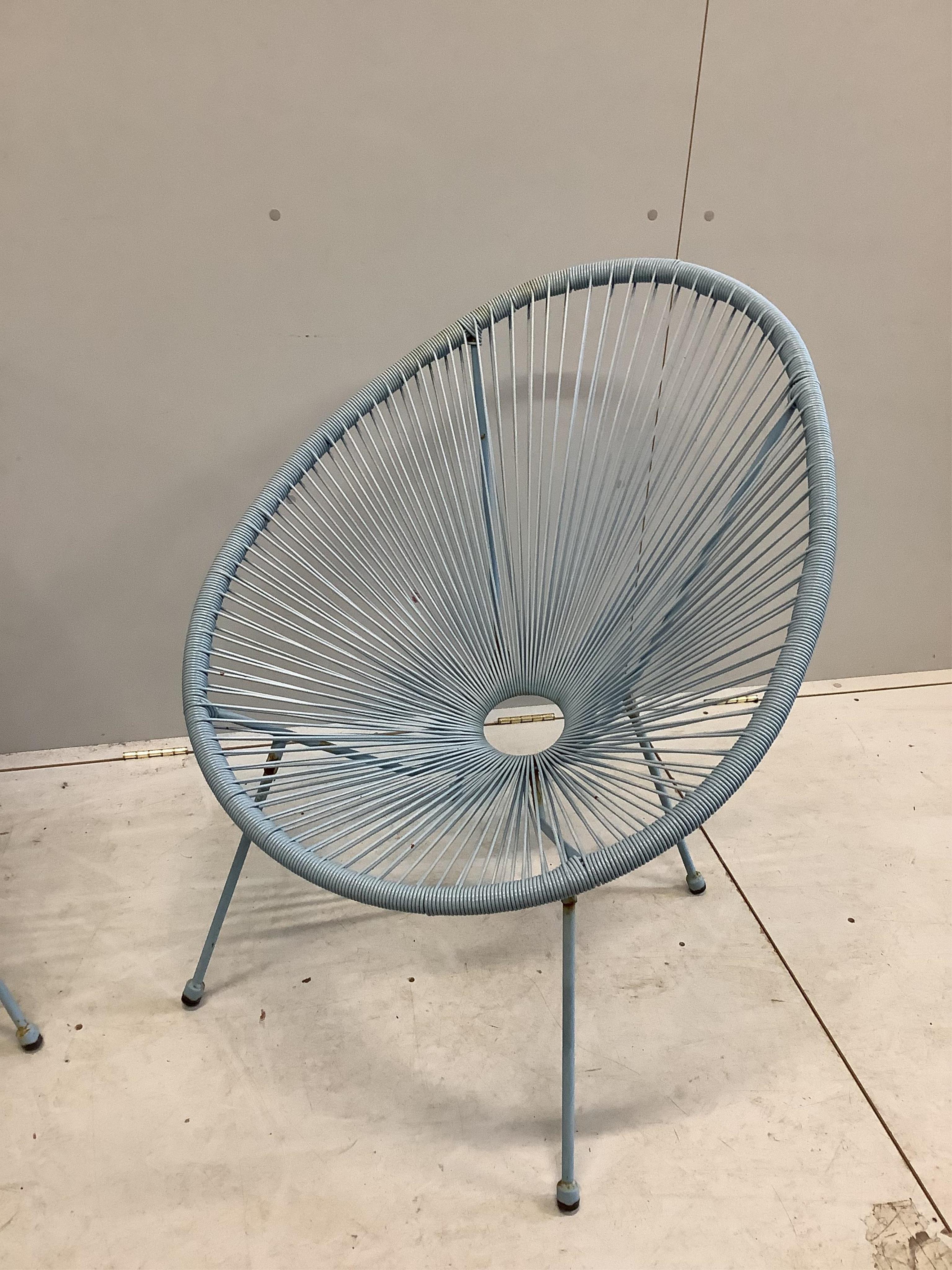 A pair of string garden egg chairs, width 72cm, height 88cm together with a table. Condition - fair